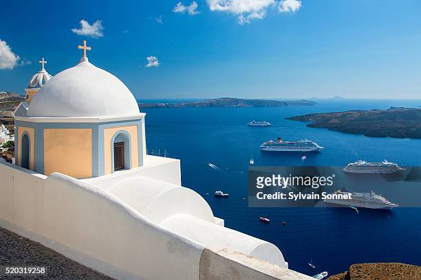 greece, santorini, fira (thera), church domes - greece foto e immagini stock