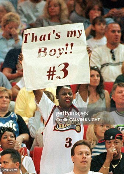 Ann Iverson holds a sign up on mothers day for her son Philadelphia 76ers guard Allen Iverson who scored 30 points during game one of the first round...