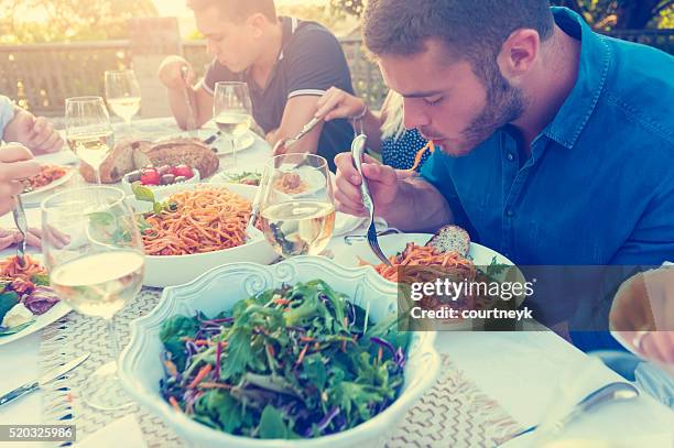 group of friends having a meal outdoors. - restaurant sydney outside stock pictures, royalty-free photos & images