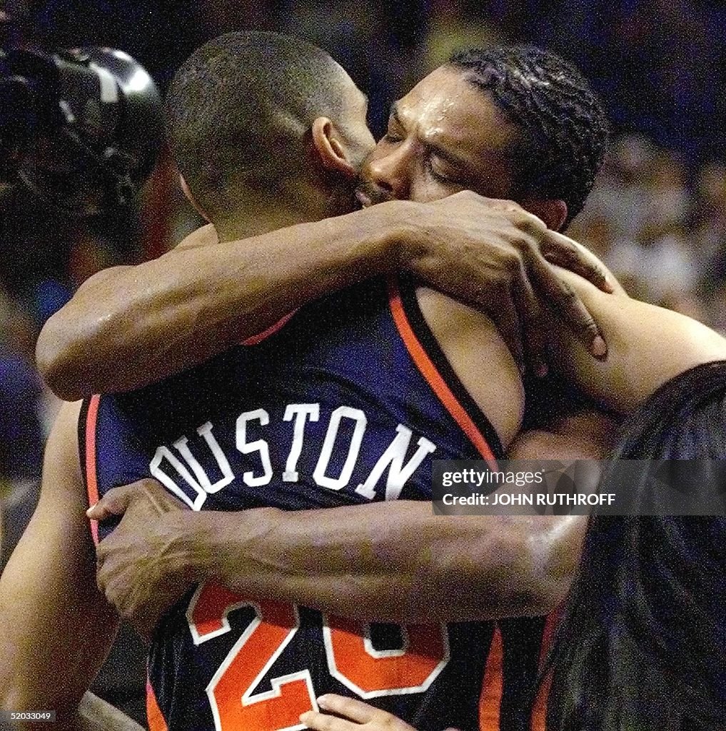 Latrell Sprewell (R) of the New York Knicks hugs h