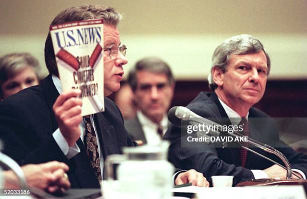 James Johnston , chairman and chief executive of R.J. Reynolds Tobacco Company, holds up a recent copy of the news magazine U.S. News and World...