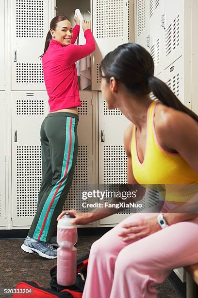 two women in a locker room - pictures of containers seized by customs stock pictures, royalty-free photos & images