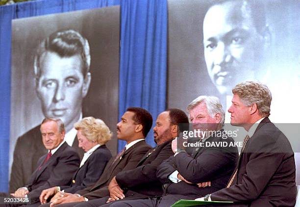 President Bill Clinton sits with, from right, US Senator Ted Kennedy, Martin Luther King III, Dexter Scott King, Ethel Kennedy and Irish Prime...