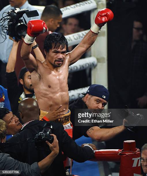Manny Pacquiao celebrates at the end of the 12th round of his welterweight fight against Timothy Bradley Jr. On April 9, 2016 at MGM Grand Garden...