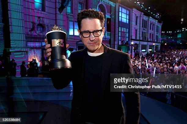 Director/producer J.J. Abrams accepts the award for Movie of the Year for 'Star Wars: The Force Awakens' onstage during the 2016 MTV Movie Awards at...