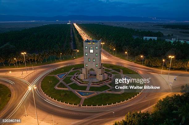 salalah clock tower at twilight - salalah stock pictures, royalty-free photos & images