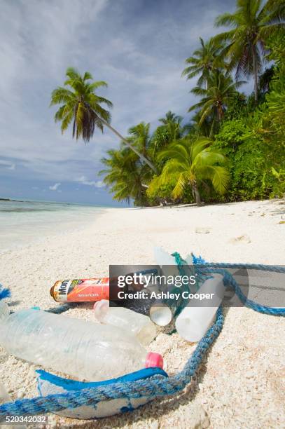 litter washed up on tepuka island in tuvalu - garbage polynesia stock pictures, royalty-free photos & images
