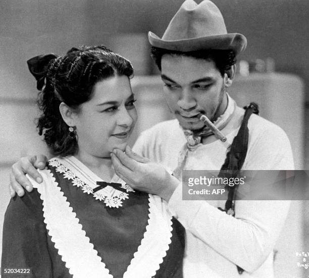 This photo shows Mario Moreno "Cantinflas," when the actor was probably in his 40's. Fotografia de Mario Moreno "Cantinflas" en el curso del rodaje...