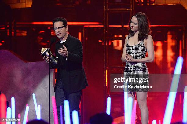 Director J.J. Abrams and actress Daisy Ridley accept the Movie of the Year award for 'Star Wars: The Force Awakens' onstage during the 2016 MTV Movie...