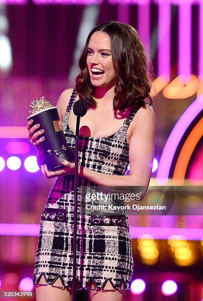 Actress Daisy Ridley accepts the Movie of the Year award for 'Star Wars: The Force Awakens' onstage during the 2016 MTV Movie Awards at Warner Bros....