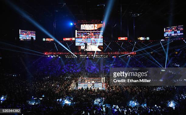 General view shows Manny Pacquiao and Timothy Bradley Jr. In the ring during the second round of their welterweight fight at MGM Grand Garden Arena...