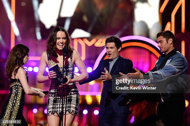 Actress Daisy Ridley accepts the Breakthrough Performance award for 'Star Wars: The Force Awakens' from actors Anna Kendrick, Adam DeVine and Zac...