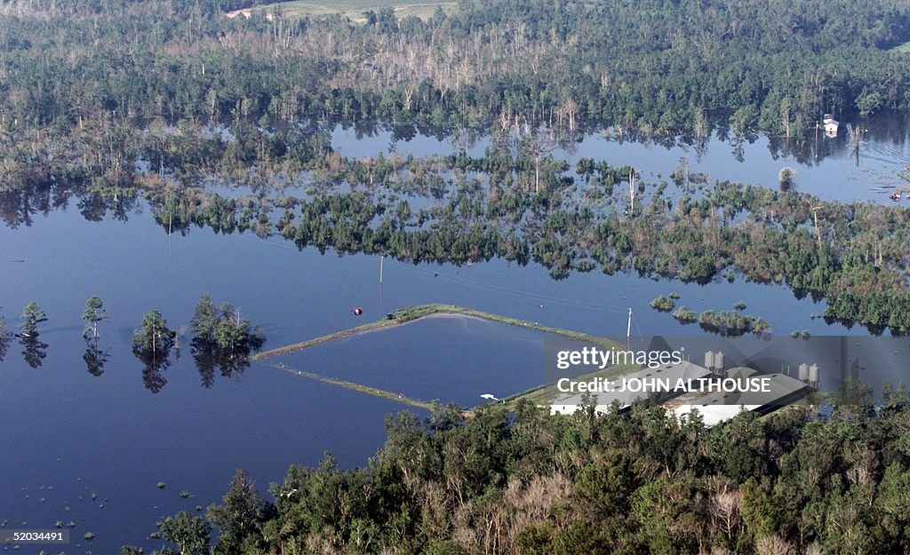 As flood waters from Hurricane Floyd begin to rece