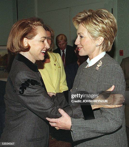 First Lady Hillary Rodham Clinton greets Aline Chretien, wife of Canadian Prime Minister Jean Chretien, 30 September, 1999 at the start of the Ninth...