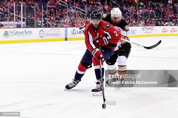 Matt Niskanen of the Washington Capitals controls the puck against Andrew Cogliano of the Anaheim Ducks in the third period during their game at...