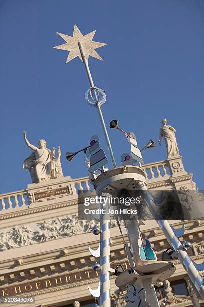 christmas decoration in front of burgtheater in vienna - burgtheater wien stock pictures, royalty-free photos & images