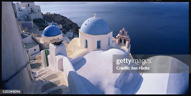 detail of white wash church with blue domes - mediterranean-blue-roof-santorini stock pictures, royalty-free photos & images
