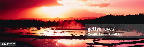 basin of great fountain geyser at sunset - great fountain geyser stock pictures, royalty-free photos & images