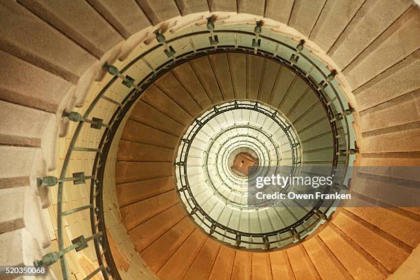 spiral staircase at eckmuhl lighthouse in brittany - spiral staircase stock pictures, royalty-free photos & images