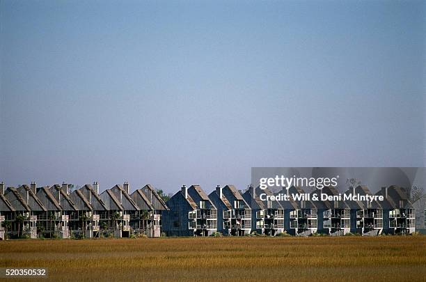 apartment buildings under blue sky - 1989 hurricane hugo stock pictures, royalty-free photos & images