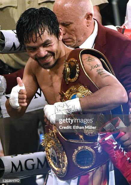 Manny Pacquiao celebrates as he leaves the ring after defeating Timothy Bradley Jr. By unanimous decision in their welterweight fight on April 9,...