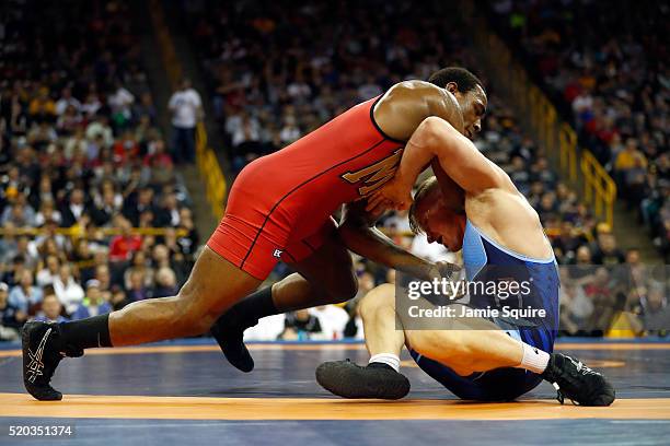 Den Cox and Kyle Dake compete in their 85kg freestyle match on day 2 of the 2016 U.S. Olympic Team Wrestling Trials at Carver-Hawkeye Arena on April...