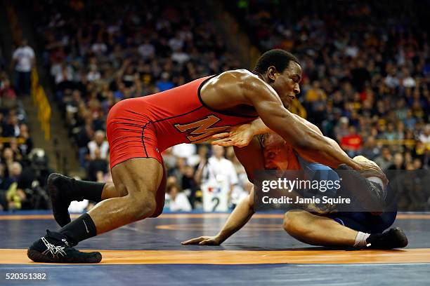 Den Cox and Kyle Dake compete in their 85kg freestyle match on day 2 of the 2016 U.S. Olympic Team Wrestling Trials at Carver-Hawkeye Arena on April...