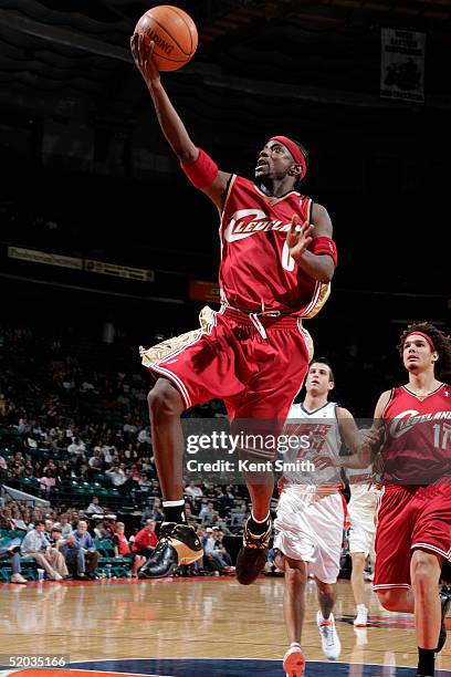 Jeff McInnis of the Cleveland Cavaliers takes the fast break for a layup against the Charlotte Bobcats on January 3, 2005 at the Charlotte Coliseum...