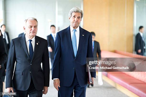 Secretary of State John Kerry and Canada's Foreign Minister John Russell Baird attend a working session at the G7 Foreign Ministers Summit on April...