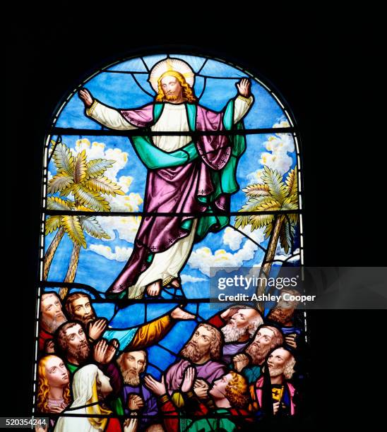 the ascension of jesus christ stained glass window - ascension of jesus christ fotografías e imágenes de stock