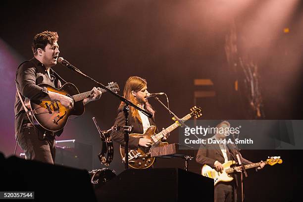 Marcus Mumford, Winston Marshall, and Ted Dwane of Mumford and Sons perform at BJCC on April 10, 2016 in Birmingham, Alabama.