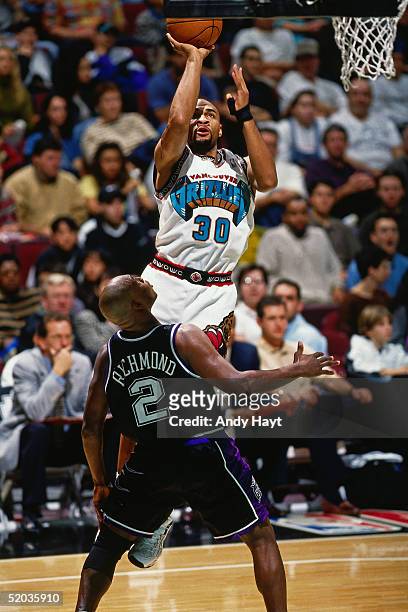 Blue Edwards of the Vancouver Grizzlies takes a jump shot against the Sacramento Kings during the NBA game on November 1, 1997 in Vancouver, British...