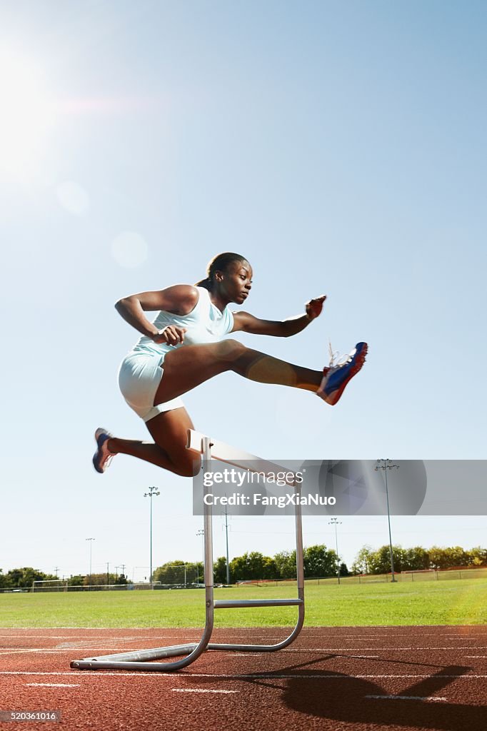 Hurdler in air