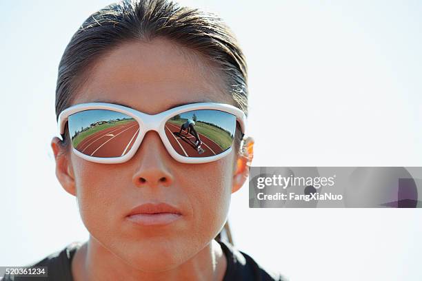 track and field athlete with sunglasses - forward athlete stockfoto's en -beelden