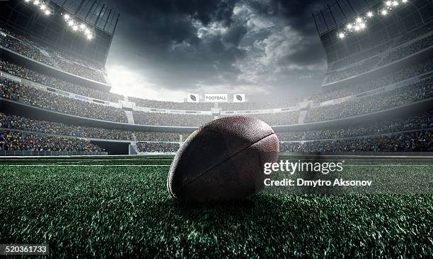 american football ball - american football team stockfoto's en -beelden