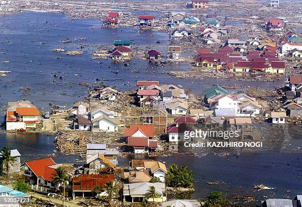 An aerial picture shows the devastated area of Banda Aceh following the tsunami disasters, 20 January 2005. Indonesia's official death toll from last...