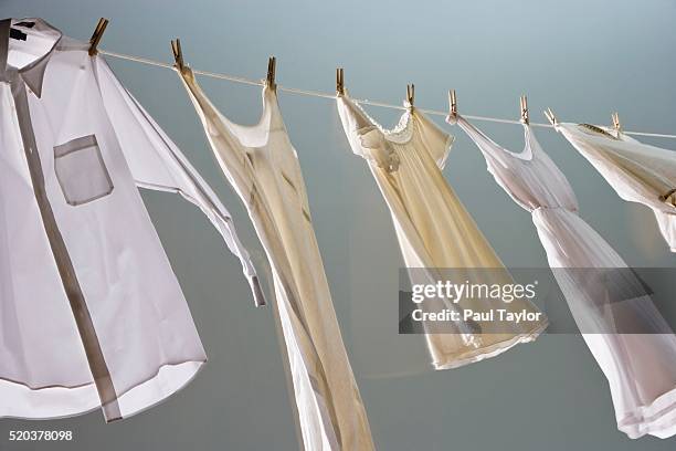 clothesline - washing line stock pictures, royalty-free photos & images