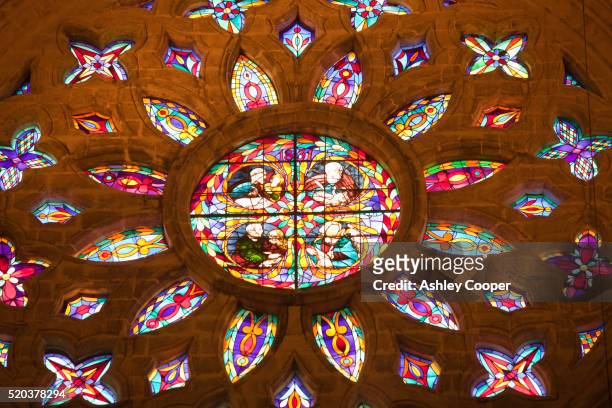 a rose window in seville cathedral, spain. - rosettfönster bildbanksfoton och bilder