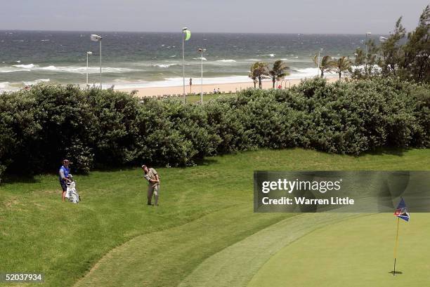 David Howell of England chips onto the first green during the first round of the South African Airways Open at Durban Country Club on January 20,...