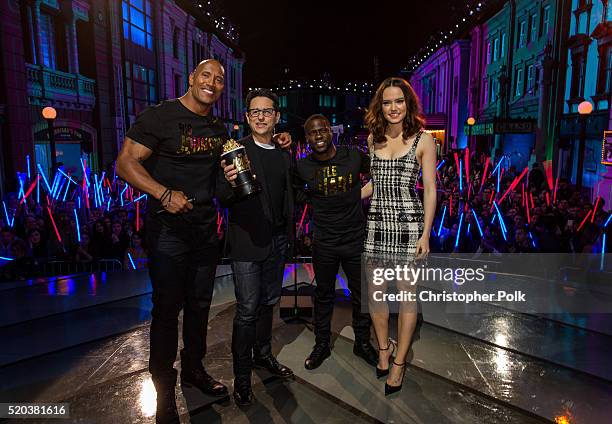 Co-hosts Dwayne Johnson and Kevin Hart present the award for Movie of the Year for 'Star Wars: The Force Awakens' to director/producer J.J. Abrams...