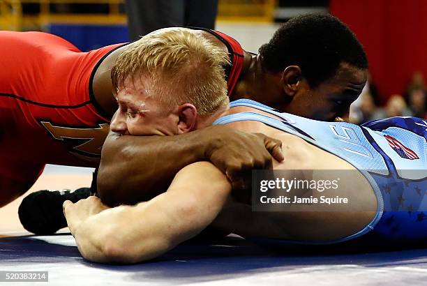 Kyle Dake and J'Den Cox compete in the 86kg freestyle championship match during day 2 of the 2016 U.S. Olympic Team Wrestling Trials at...