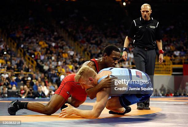 Kyle Dake and J'Den Cox compete in the 86kg freestyle championship match during day 2 of the 2016 U.S. Olympic Team Wrestling Trials at...