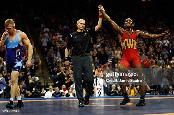 Den Cox celebrates after defeating Kyle Dake in the 86kg freestyle championship match during day 2 of the 2016 U.S. Olympic Team Wrestling Trials at...