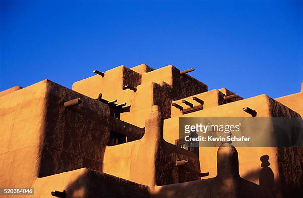 pueblo and blue sky - new mexico stock pictures, royalty-free photos & images