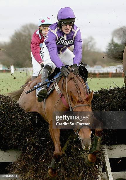 Our Prima Donna' ridden by Tony McCoy goes through the fence as winner 'Bak To Bill' ridden by Miss L Gardner goes on to win The Ludlow For...