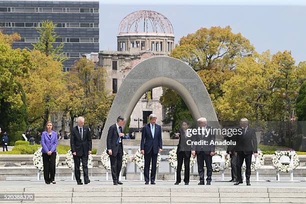 Japanese Foreign Minister Fumio Kishida , US Secretary of State John Kerry , European Union's High Representative for Foreign Affairs Federica...