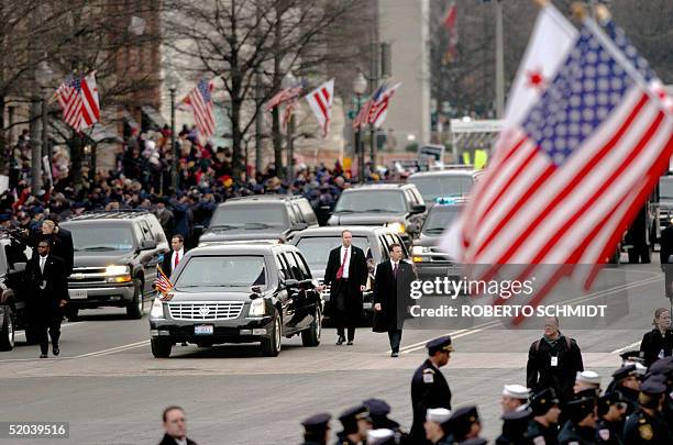 Amid heavy security, the motorcade containing the limousine carrying US President George W. Bush makes its way down Pennsylvania Avenue enroute to...