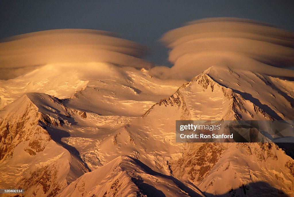 Lenticular Clouds Shrouding the Peaks of Mount McKinley