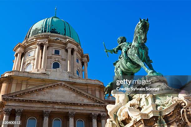 budapest, equestrian statue of prince eugene and royal palace - royal palace budapest stockfoto's en -beelden