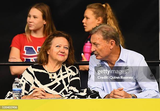 Gina Rinehart speaks to John Bertrand the Swimming Australia President during day five of the Australian Swimming Championships at the South...